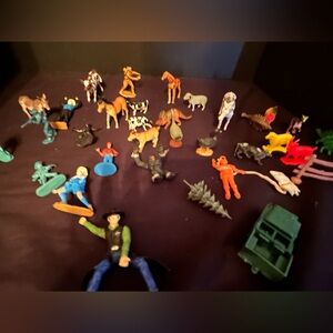 Plastic toy animals, people and dinosaur lot